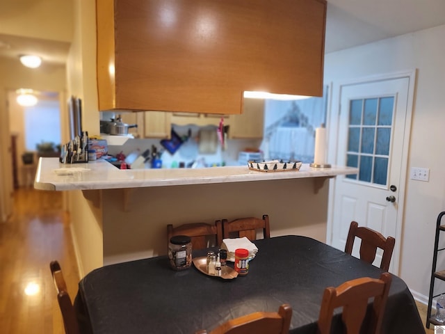 dining area featuring wood-type flooring