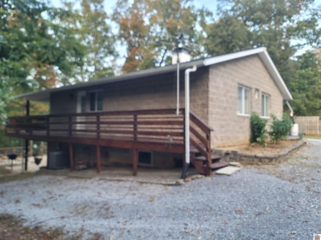 view of home's exterior featuring a deck