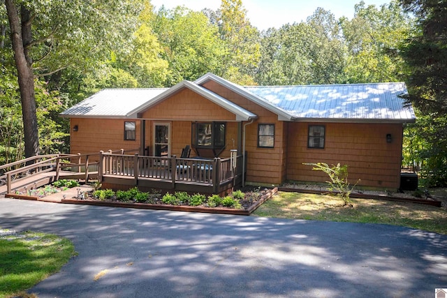 ranch-style house with a deck