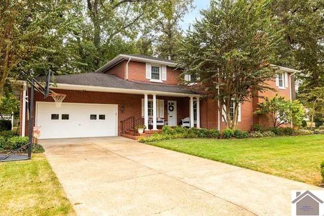 view of front facade featuring a front yard, a porch, and a garage