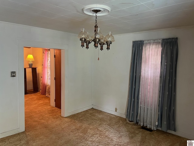 2234 Ted Williams, Paducah, KY 42003 - spare room with carpet floors, a chandelier, and ornamental molding