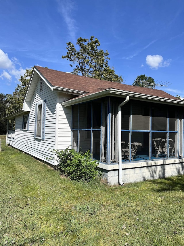 2234 Ted Williams, Paducah, KY 42003 - back of house with a sunroom, a lawn, and a shingled roof