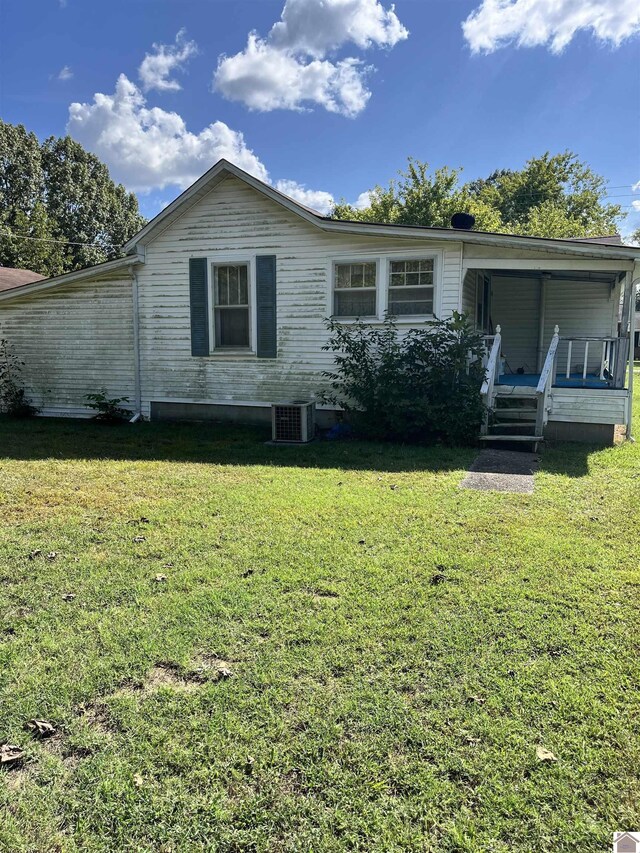 2234 Ted Williams, Paducah, KY 42003 - view of front of property with central air condition unit, a front lawn, and covered porch