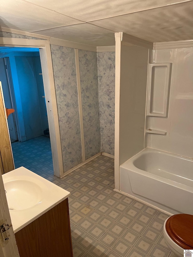 2234 Ted Williams, Paducah, KY 42003 - full bath featuring tile patterned floors, toilet, vanity, baseboards, and shower / washtub combination