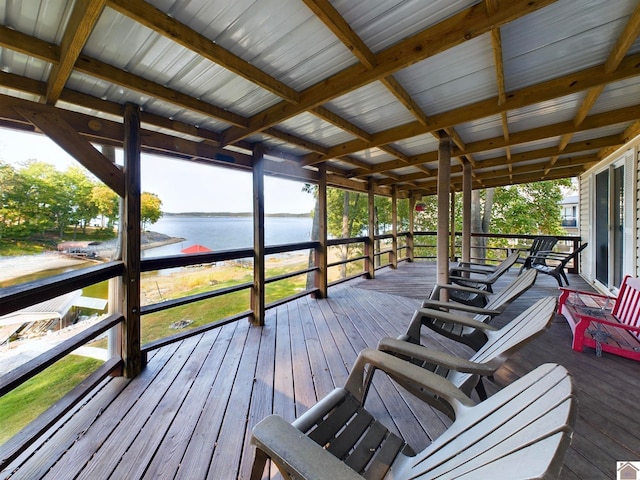 wooden terrace with a water view