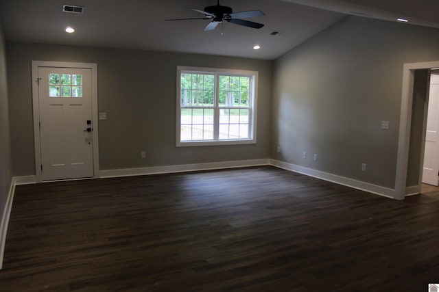 entrance foyer with vaulted ceiling, dark wood-type flooring, and ceiling fan