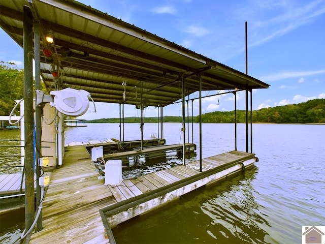 view of dock with a water view