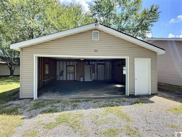 garage with wood walls