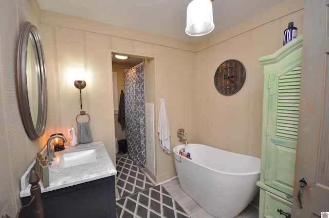 bathroom featuring shower with separate bathtub and vanity