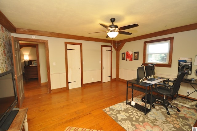 office area with wood-type flooring and ceiling fan