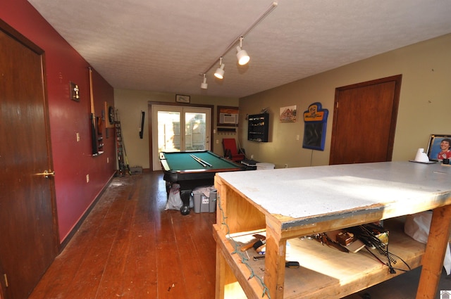 playroom with track lighting, a textured ceiling, dark wood-type flooring, and pool table