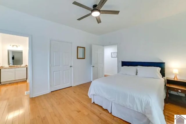 354 Sassafrass Rd, Cadiz, KY 42211 - bedroom featuring light wood finished floors, ensuite bathroom, a ceiling fan, and baseboards