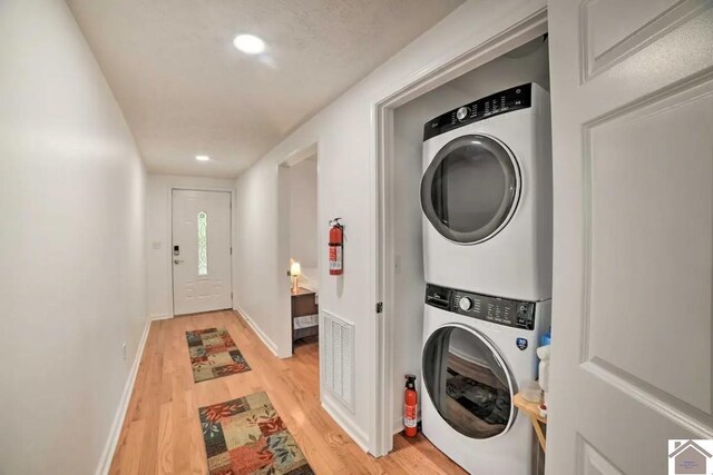 354 Sassafrass Rd, Cadiz, KY 42211 - laundry room featuring stacked washer / drying machine, light wood finished floors, baseboards, and recessed lighting