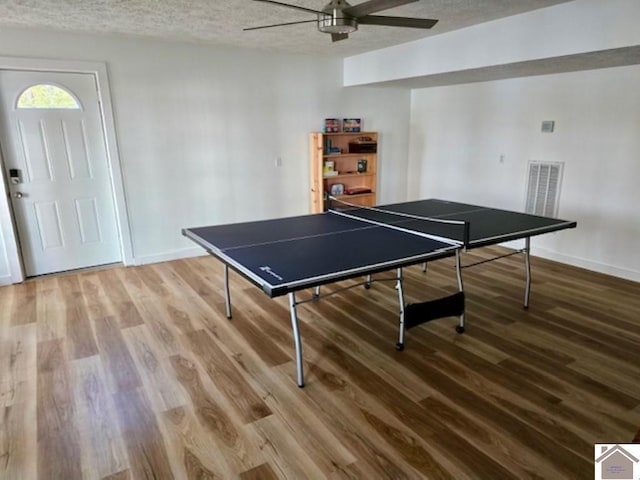 354 Sassafrass Rd, Cadiz, KY 42211 - recreation room with ceiling fan, wood finished floors, a textured ceiling, and baseboards