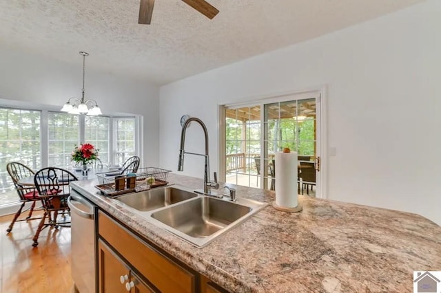 354 Sassafrass Rd, Cadiz, KY 42211 - kitchen with dishwasher, a sink, a textured ceiling, decorative light fixtures, and ceiling fan