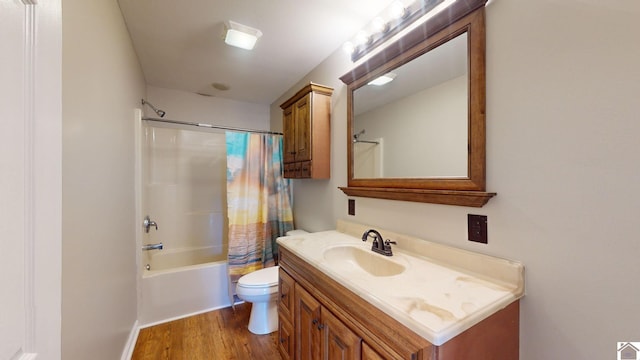 full bathroom featuring shower / tub combo, vanity, toilet, and hardwood / wood-style floors