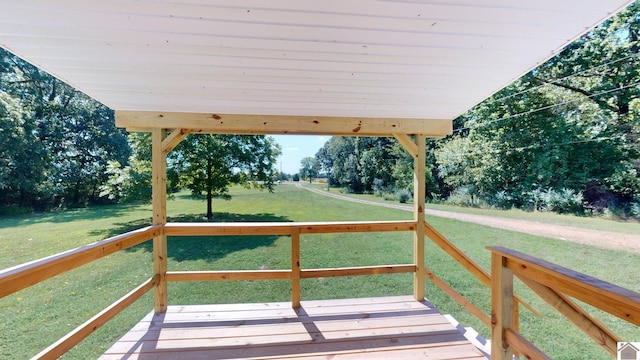 deck featuring a lawn