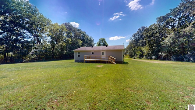 view of yard featuring a deck