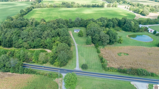 drone / aerial view featuring a rural view and a water view