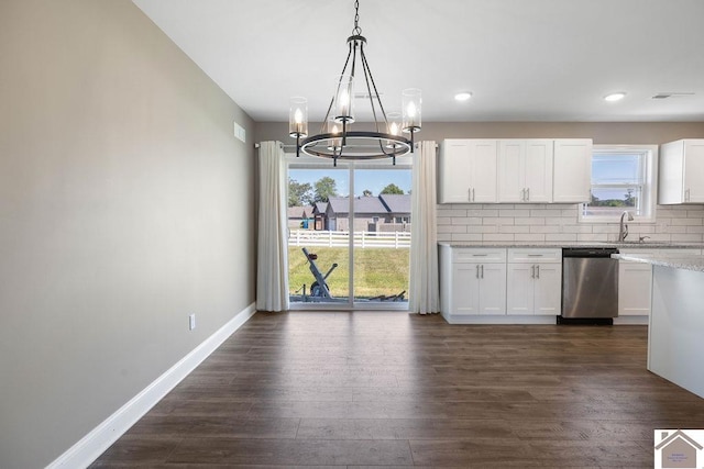 2216 Traci Dr, Murray, KY 42071 - kitchen with stainless steel dishwasher, a chandelier, dark wood-style flooring, baseboards, and recessed lighting