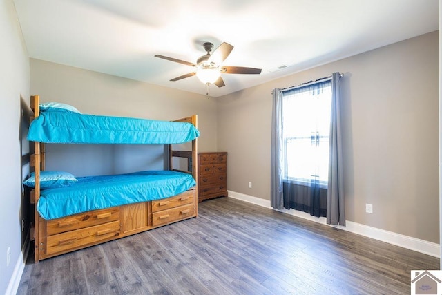 2216 Traci Dr, Murray, KY 42071 - bedroom with wood finished floors, baseboards, and a ceiling fan