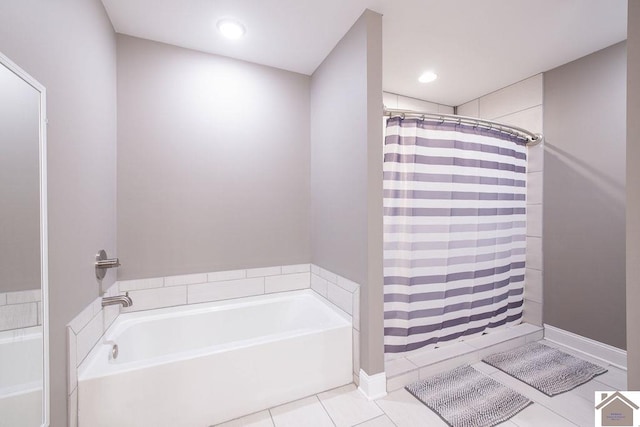 bathroom featuring shower with separate bathtub and tile patterned flooring