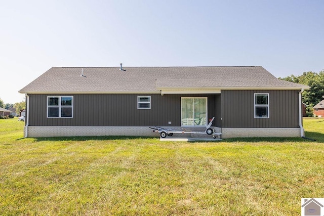 2216 Traci Dr, Murray, KY 42071 - rear view of property with a yard, brick siding, and a shingled roof