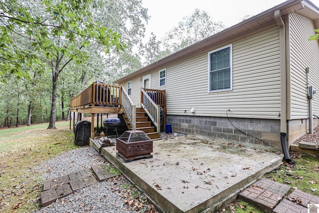 back of property with a deck