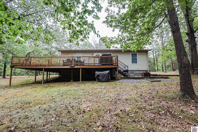 back of property featuring a deck