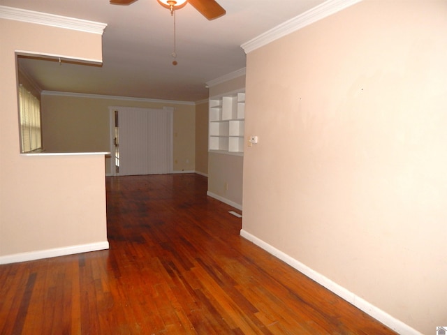 hall with ornamental molding, dark hardwood / wood-style floors, and built in features