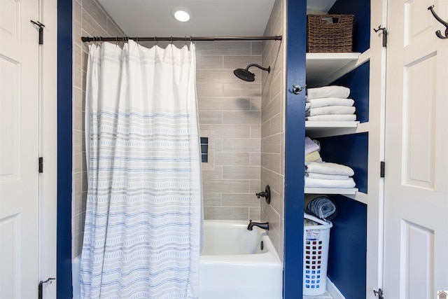 bathroom featuring shower / tub combo with curtain