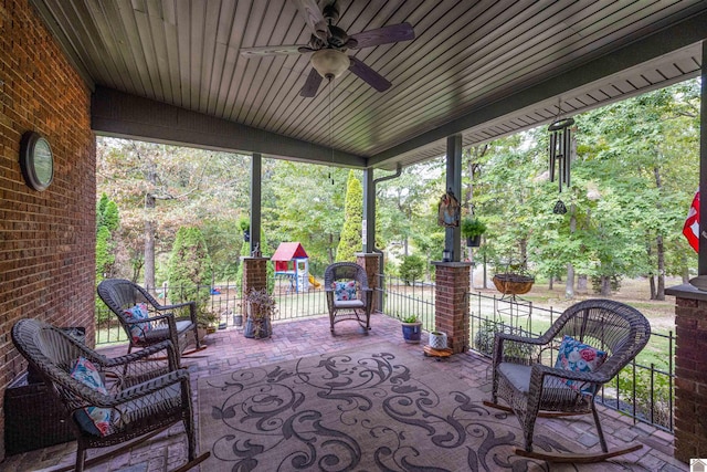 view of patio featuring ceiling fan