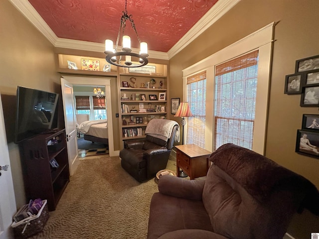 carpeted living room featuring a notable chandelier and ornamental molding