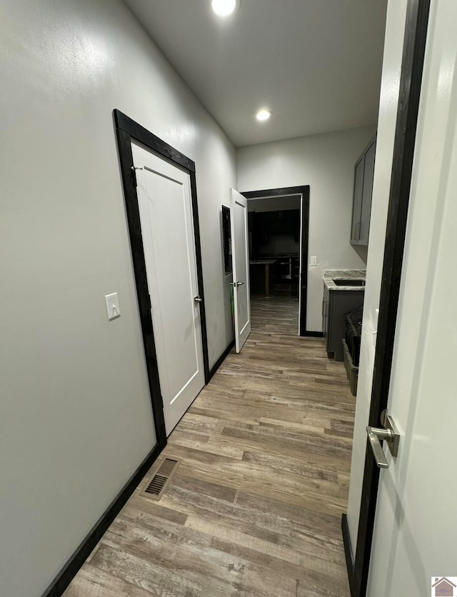 hall featuring light wood-type flooring