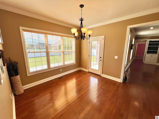 interior space with crown molding, dark hardwood / wood-style flooring, and a chandelier