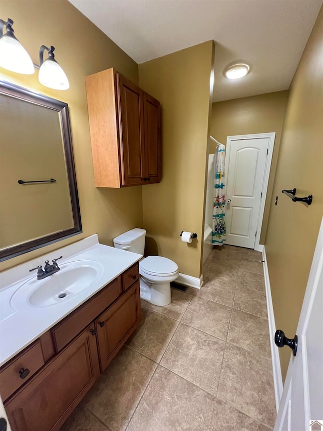 full bathroom with shower / tub combo, tile patterned floors, vanity, and toilet