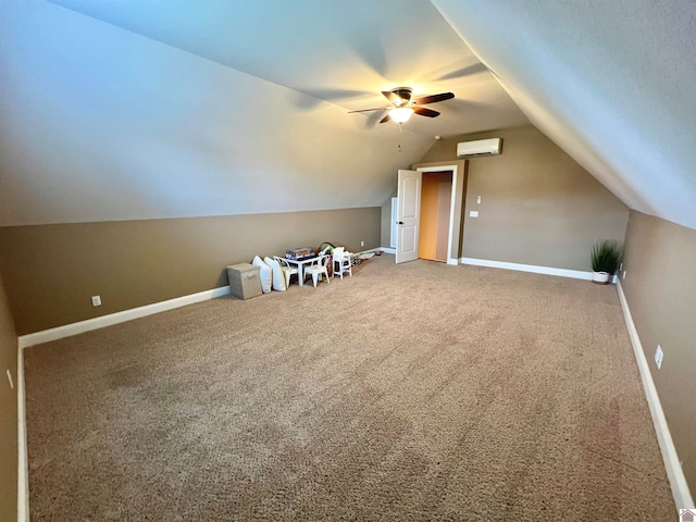 additional living space with ceiling fan, lofted ceiling, carpet flooring, and a wall mounted AC