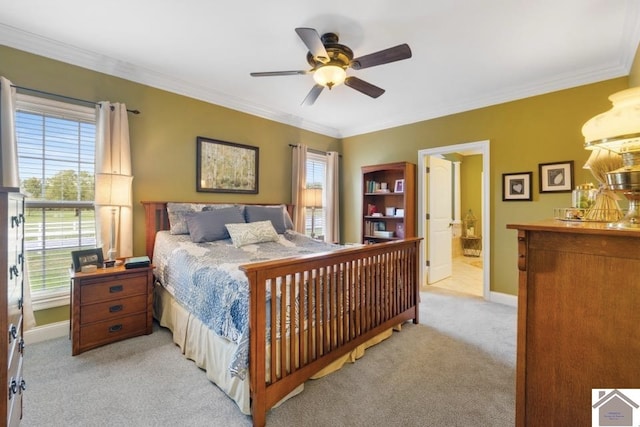 bedroom featuring light carpet, ornamental molding, multiple windows, and ceiling fan