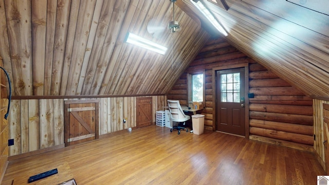 additional living space with wooden ceiling, vaulted ceiling, and hardwood / wood-style flooring