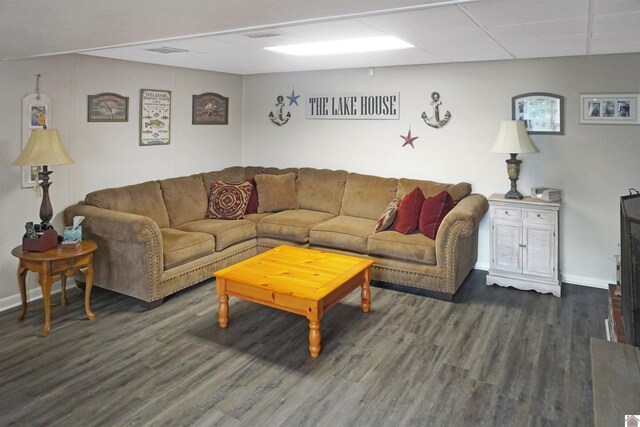 living room with dark hardwood / wood-style flooring