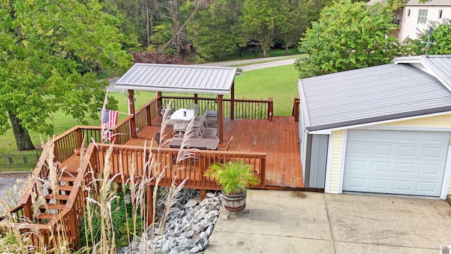 exterior space with a front yard, a garage, and a deck