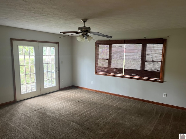 unfurnished room featuring ceiling fan, a textured ceiling, and carpet flooring