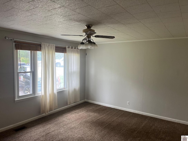 unfurnished room featuring carpet, ornamental molding, and ceiling fan