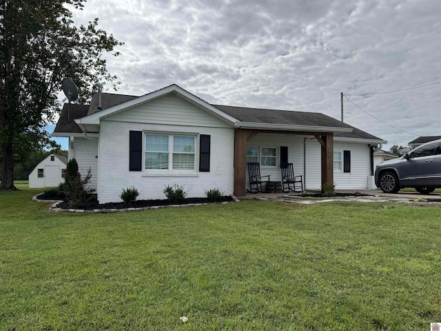 ranch-style house with a front yard