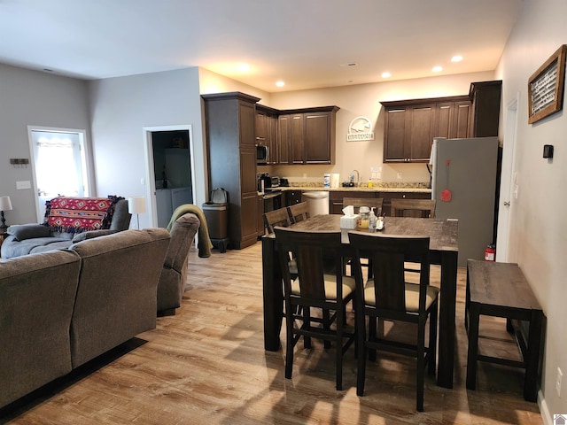 dining room with light hardwood / wood-style floors