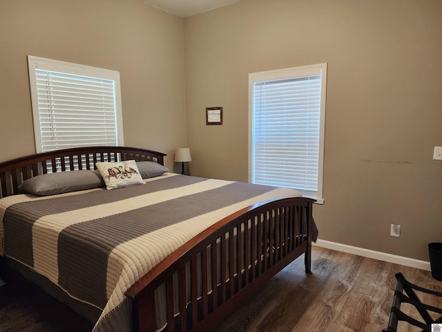 bedroom featuring dark hardwood / wood-style floors