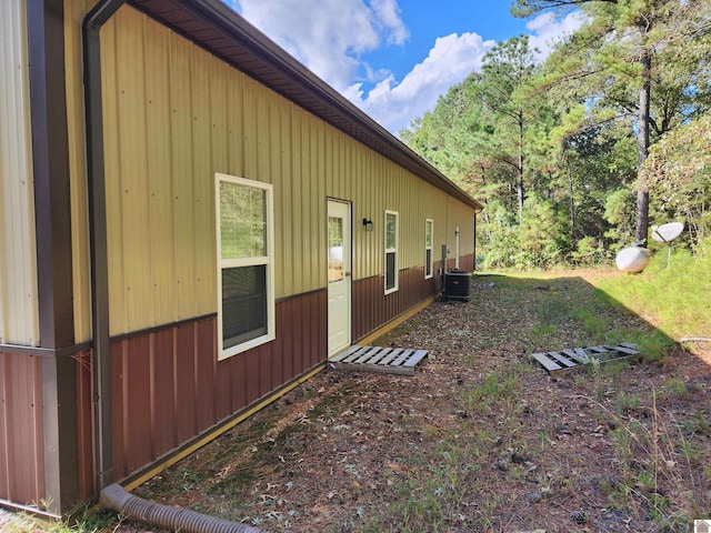 view of side of property featuring cooling unit