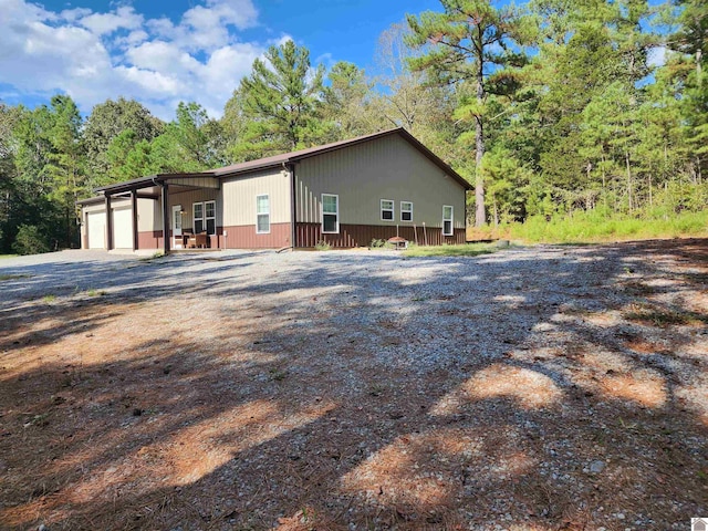 view of property exterior with a garage