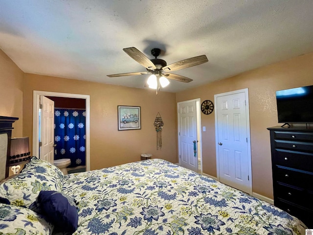 bedroom featuring a textured ceiling, ceiling fan, and ensuite bathroom