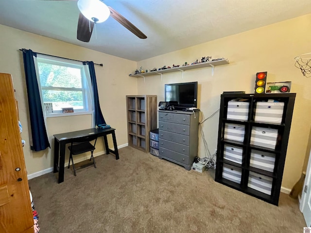 carpeted office with ceiling fan